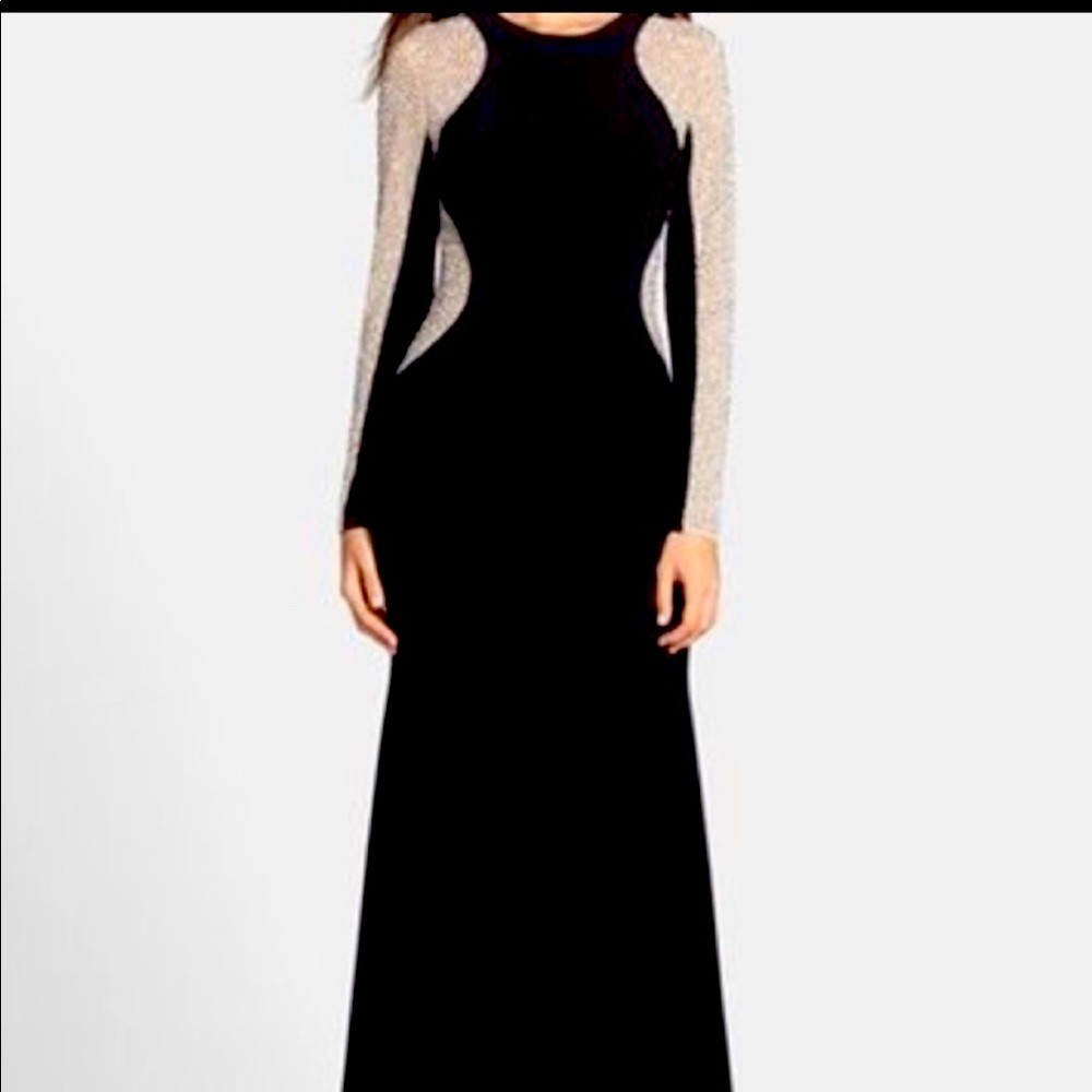 Xscape 2P black, embellished, long sleeve gown.